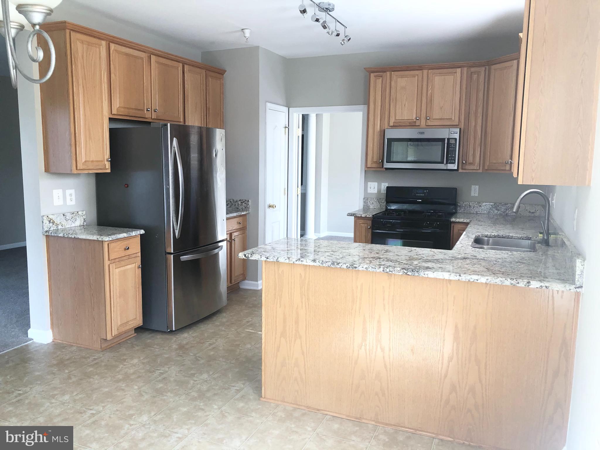 THE RESERVE CONDOMINIUMS - Residential Lease