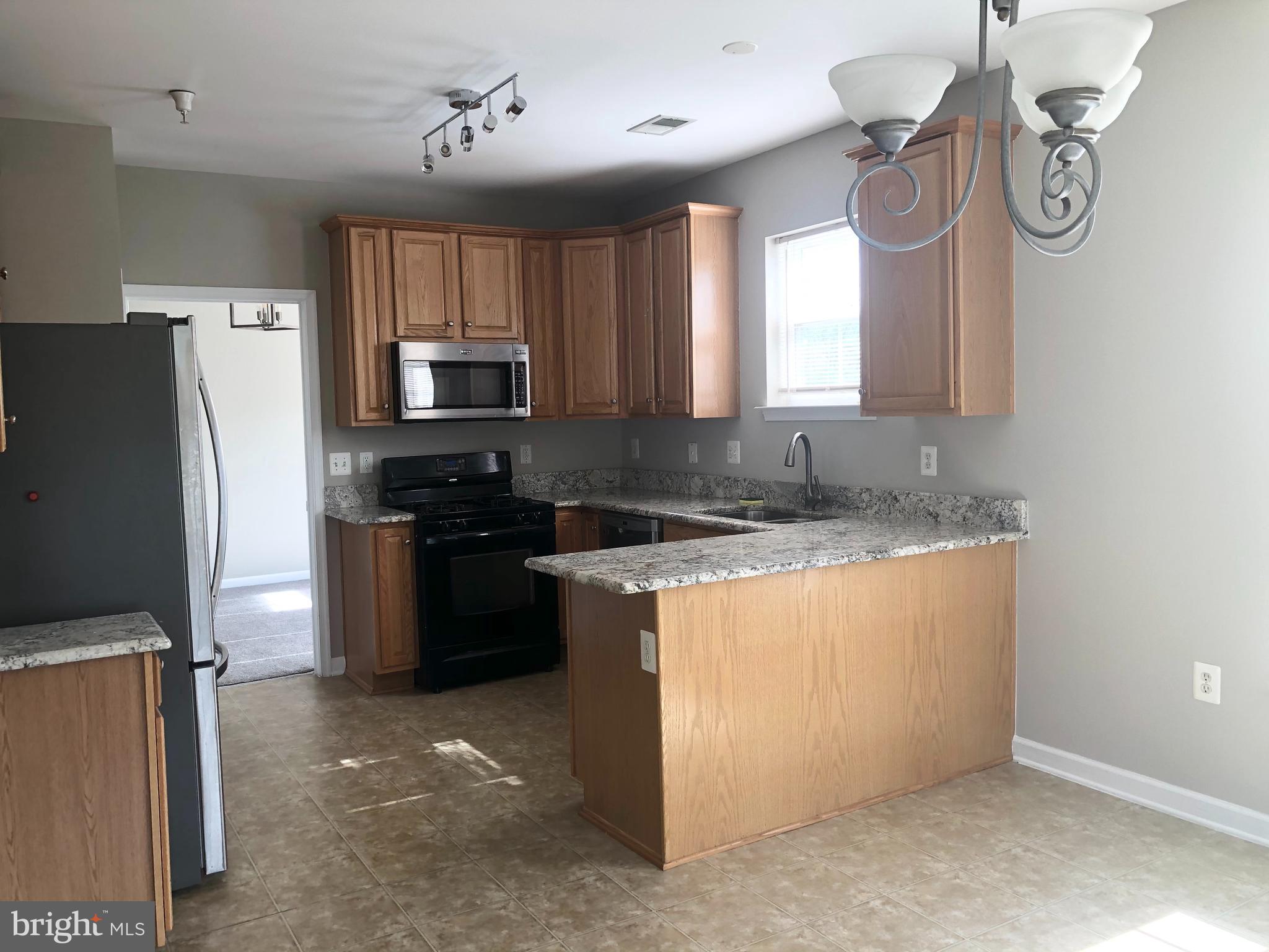 THE RESERVE CONDOMINIUMS - Residential Lease