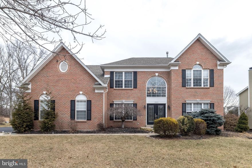 Nestled in the desirable Ridings of Buckingham community, this beautifully updated brick-front Chesterfield model by Cutler is move-in ready with a quick settlement possible. A grand double-door entry welcomes you into a stunning two-story foyer with a turned staircase and brand-new hardwood floors that flow throughout both levels of the home. Just off the foyer, a private main-floor office provides the perfect space for remote work. The living room and dining rooms are open, and lead to a newly remodeled kitchen featuring 42” white cabinetry, Quartz countertops with a subway tile backsplash, a center island with seating, brand-new stainless steel appliances, and a double sink. The sunlit breakfast area features sliding glass doors to an expansive deck overlooking a picturesque backyard that backs to farmland, offering scenic views of a historic barn. The kitchen and breakfast area flow seamlessly to the cozy family room, where a striking new stacked stone gas fireplace, flanked by sunrise windows, creates a warm and inviting ambiance. A convenient beverage bar with an under-counter cooler enhances the space. On the other side of the kitchen, the mud/laundry room has a private side entry, along with access to an updated powder room and the two-car garage, complete with new doors and openers. Upstairs, the expansive primary suite boasts vaulted ceilings, a cozy sitting area, a generous walk-in closet, and a newly renovated bathroom featuring a soaking tub and modern finishes. Three additional well-sized bedrooms offer ample closet space and share a full hall bathroom with a double sink. The fully finished basement expands the living space with a half bath, Bilco doors for easy outside access, and even an unfinished section with a utility sink. Additional updates include a brand-new roof, new exterior doors, new staircase and railings, new LED recessed lighting, all-new outlets and switches, two-zone smart thermostats, a security system, new smoke detectors, and more! Located in the award-winning Central Bucks School District, this home is walking distance to  parks, and  to  charming Doylestown Borough with shopping, fine dining, and the SEPTA Regional Rail Line.  Don't miss this opportunity to own a beautifully updated home in a prime location!