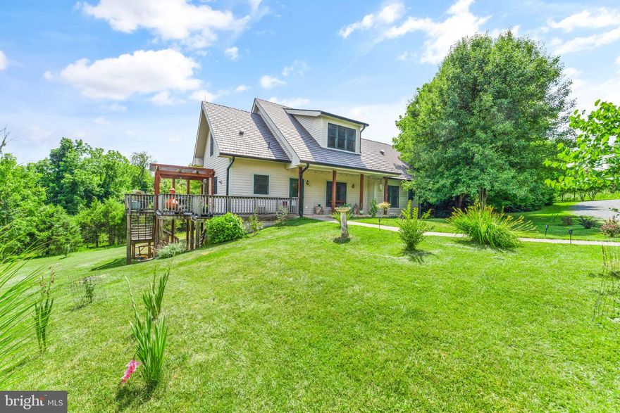 A beautiful rental awaits you with this custom-built home in a great location in Loudoun County.
*Available as of June 1, 2025
4 Bedrooms, 2 Full Baths, 3 Levels with a Fully Finished Basement. The wrap around deck has mountain views and the .58-acre lot backs up to trees and common area, giving you a spacious and private back yard. This home is energy efficient and utilizes environmentally friendly building materials. Walking into this home, you will fall in love with the beautiful, reclaimed oak hardwood floors. There are 2 bedrooms/home office and 1 full bath on the main level. The living room has a cathedral ceiling and wonderful daylight. The dining area is off of the kitchen and also has a door which opens out onto the deck. There is a stylish barn door that leads to the 3rd bedroom (or main level office). On the second level, there are 2 bedrooms, 1 full bath and an open loft area which makes a great study / work area, or yoga / fitness area. The lower level is a walk-out basement, and has a bright family room, laundry room, and workshop. There is also plenty of storage space. 
        This home utilizes passive solar design, and the south-facing orientation and maximal window placement promotes natural daylighting, resulting in a bright and inviting living space, even on the lower level. The high-efficiency windows are argon filled, reducing solar heat gain, and decreasing cooling requirements in the summer. Heating and cooling of the home is extremely efficient through the geothermal heat pump which draws on the earth's constant temperature, thus using far less energy than air-to-air heat pumps = lower electric bills! Structural insulated panels (SIP's) were used for the exterior walls and there is a new roof on the home. The exterior Hardi Plank siding looks like wood but is a fiber-cement composition and is immune to termite and insect damage. 
       The community has interconnected walking paths, a large playground, and an electric car charging station. Enjoy healthy living and the use and benefit of 100 acres in conservation land with maintained walking trails - offering idyllic scenery, mountain views, meadows, streams, a wildlife sanctuary certified through the Audubon at Home Program, and a Monarch butterfly waystation. This home and the surrounding landscape, trails, and views are a dream come true! This type of rental property is nearly impossible to find in Loudoun County. Plus, the location is conveniently just 5 miles from the Point of Rocks MARC train station, making for an easy commute into D.C.   5 minutes away, downtown Lovettsville has numerous shops, salons, restaurants, Drs offices, and a COOP grocery store. Located just 30 mins to Dulles airport, 20 mins to Leesburg and 20 mins to Frederick MD its situated in a great area for commuting, shopping, breweries, wineries, C& O canal, W&OD trails and the Potomac River.
APPLY TODAY via Rentspree! Fee is $49.99   https://apply.link/Qk_hf_4