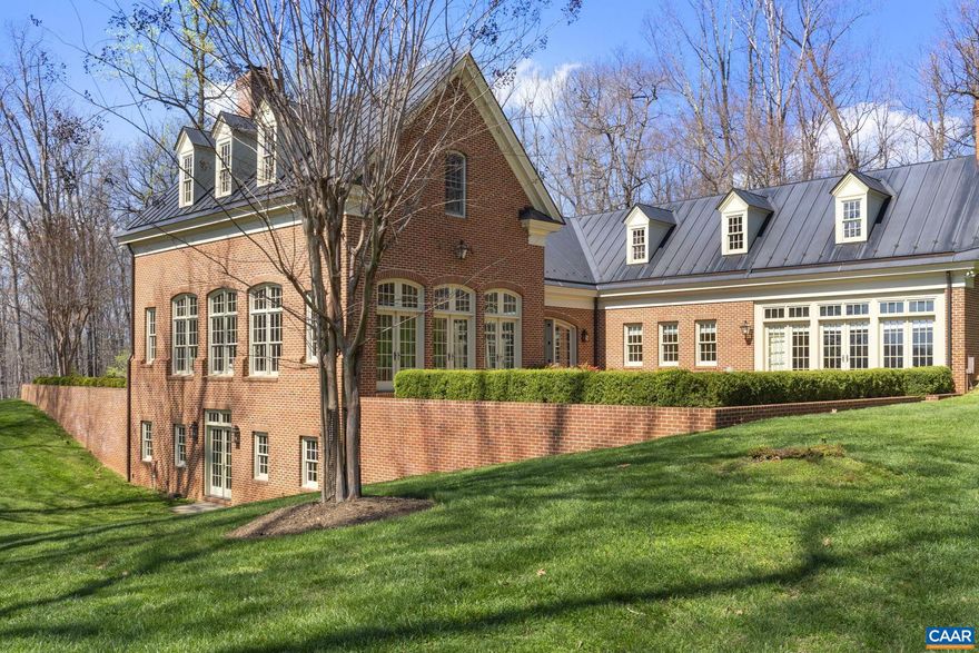 Stunning one owner home nestled in the coveted Ivy neighborhood of Blue Springs Farm, just 15 minutes to UVA and downtown Charlottesville. An elegant combination in design of old Virginia charm and sprinkled with French flair. Situated on a gentle knoll with oversized windows and doors, you can enjoy the sweeping pastoral and mountain views. This solidly built home offers quality construction with copper roof, gutters, downspouts and top of the line mill work, both inside and out. 4 zone Geothermal heat pumps, whole house generator and deluxe water treatment system are just a few of the important upgrades. Two private courtyards with babbling fountains can be accessed from three different living spaces. Exceptionally high ceilings throughout, frame this home. Large unfinished basement also offers a bank of windows with views and is ready to finish, if needed. A perfect property for someone desiring a luxury home with majority of finished space on main level with no steps.,Soapstone Counter,Fireplace in Great Room,Fireplace in Master Bedroom