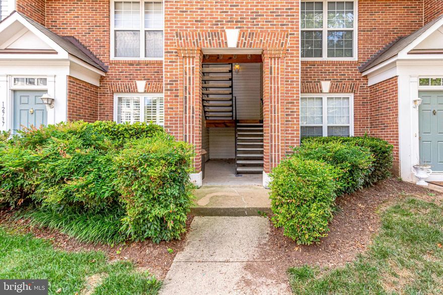Ideally situated just off I-66 in the sought-after Fair Lakes area, this well-appointed third-floor corner residence offers both comfort and convenience in a vibrant Northern Virginia setting. The location places you moments from a wide variety of shopping, dining, and everyday essentials, while still providing a peaceful residential atmosphere. Inside, the home features an open and inviting layout designed for both daily living and entertaining. The kitchen flows seamlessly into the main living area, where a striking three-sided fireplace creates a warm focal point and enhances the sense of space. Large windows invite natural light throughout, while the corner position offers added privacy and pleasant views. Step outside to a spacious private balcony, complete with additional storage, providing a great place to relax or enjoy fresh air. The upper level offers two generously sized primary suites, each with its own private bath, creating flexible living arrangements. A conveniently located upper-level laundry area adds to the home’s thoughtful design. Fair Lakes is known for its dynamic blend of residential living and nearby amenities, offering access to scenic walking trails, recreational courts, and community spaces. With easy access to major commuter routes including I-66, Route 50, and Fairfax County Parkway, this location supports both everyday convenience and regional connectivity. Combining a functional layout, comfortable living spaces, and an ideal location, this home presents an excellent opportunity to enjoy all that the Fair Lakes area has to offer.