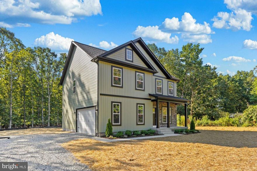 DISCOVER THE CHARM OF THIS STUNNING NEW CONSTRUCTION COLONIAL HOME, COMPLETED IN 2025, WHERE MODERN ELEGANCE MEETS TIMELESS DESIGN. NESTLED ON A GENEROUS HALF-ACRE LOT, THIS DETACHED RESIDENCE BOASTS A CAPTIVATING EXTERIOR OF VINYL SIDING AND STONE, COMPLEMENTED BY AN INVITING PORCH PERFECT FOR MORNING COFFEE OR EVENING RELAXATION. THE KITCHEN IS A CHEF'S DREAM, EQUIPPED WITH STAINLESS STEEL APPLIANCES, QUARTZ COUNTERTOPS, AN ISLAND FOR ADDITIONAL PREP SPACE, AND A CONVENIENT PANTRY. ENJOY MEALS IN THE BRIGHT BREAKFAST AREA OR THE FORMAL DINING ROOM, ADORNED WITH CROWN MOLDINGS AND CHAIR RAILINGS. WITH FOUR SPACIOUS BEDROOMS, INCLUDING A LUXURIOUS PRIMARY SUITE WITH A WALK-IN CLOSET AND A BEAUTIFULLY APPOINTED BATHROOM FEATURING A SPACIOUS WALK-IN SHOWER, COMFORT IS PARAMOUNT. ADDITIONAL HIGHLIGHTS INCLUDE RECESSED LIGHTING, BUILT-INS, AND A COZY GAS FIREPLACE IN THE FAMILY ROOM, CREATING A PERFECT AMBIANCE FOR RELAXATION. THE UNFINISHED BASEMENT OFFERS ENDLESS POSSIBILITIES FOR CUSTOMIZATION, WHILE THE UPPER FLOOR LAUNDRY HOOKUPS ADD CONVENIENCE TO YOUR DAILY ROUTINE. OUTSIDE, THE ATTACHED SIDE-ENTRY GARAGE PROVIDES AMPLE PARKING, WITH ADDITIONAL DRIVEWAY SPACE FOR GUESTS. THIS HOME IS DESIGNED FOR MODERN LIVING, ENSURING EVERY DETAIL CATERS TO YOUR NEEDS. EXPERIENCE THE PERFECT BLEND OF STYLE, COMFORT, AND FUNCTIONALITY IN YOUR NEW SANCTUARY. CONVENIENTLY LOCATED NEAR PATRIOT PARK, RAPPAHANNOCK AREA YMCA, AND PARKSIDE ELEMENTARY!  SCHEDULE YOUR APPOINTMENT TO SEE THIS HOME TODAY!