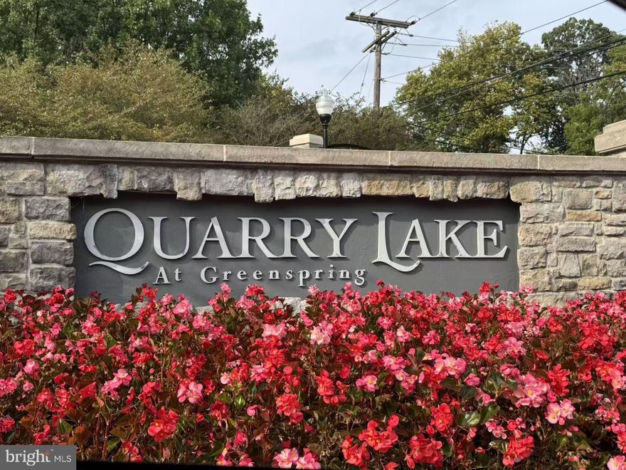 Welcome to this beautifully maintained, spacious first-floor condo in The Highlands at Quarry Lake! Offering 2 bedrooms, 2 full baths, and a bonus room as an office/den, this home features an open layout with high ceilings and abundant natural light. The gourmet kitchen boasts granite countertops, ample cabinetry, and stainless steel appliances including a newer refrigerator, while a newer washer/dryer adds convenience. The primary suite includes dual closets and a private bath with double vanities and a walk-in shower, complemented by a second bedroom and full bath for guests. Enjoy a private balcony, inside-access garage parking, and resort-style amenities—clubhouse, fitness center, pool, tennis, walking trails, and Quarry Lake—all within a secure gated community close to shops, dining, and major commuter routes!