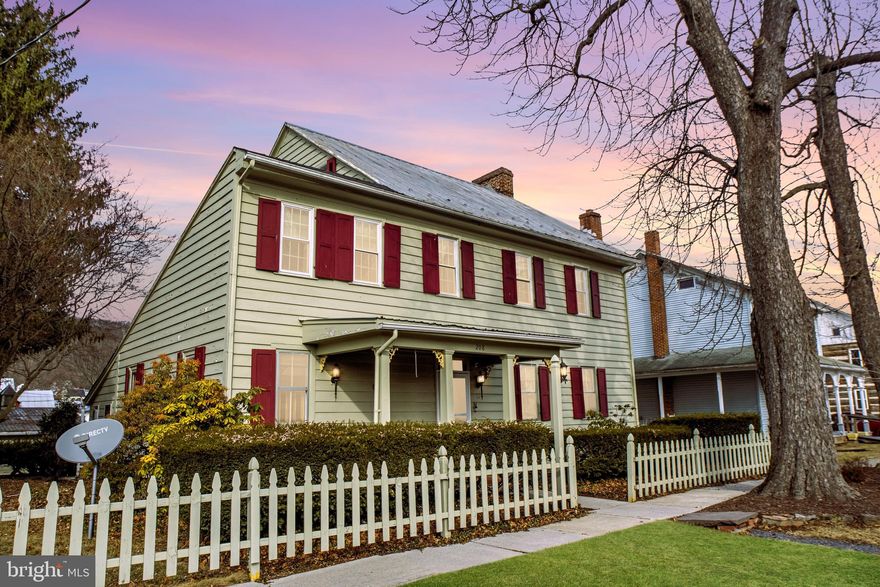 Welcome to 208 West  Arron Square, where the 1800s Log Home meets with modern updates. Step into history with this beautifully maintained 3-bedroom, 1.5-bathroom 1800s log home, seamlessly blending traditional elegance with modern comforts. Nestled in the heart of Aaronsburg and cloaked in durable cedar siding, this home radiates warmth and timeless appeal.  The welcoming open foyer and spacious living room set the stage for cozy gatherings, while the large stairway adds a touch of grandeur. The owner’s suite features a delightful bonus room turned into a large WIC. Recent updates include all-new second-floor windows, fresh paint throughout, a brand-new oil furnace, and newer appliances, ensuring comfort and efficiency.  Outside, the front of the property is surrounded by an 1800s picket-style fence, adding to its historic charm. Two versatile outbuildings provide ample parking for up to six vehicles, workshop space, and extensive storage. Conveniently located within an easy drive to State College and Penn State University, this home offers tranquility and accessibility.  Don’t miss this opportunity to own a piece of history—where character meets modern convenience!