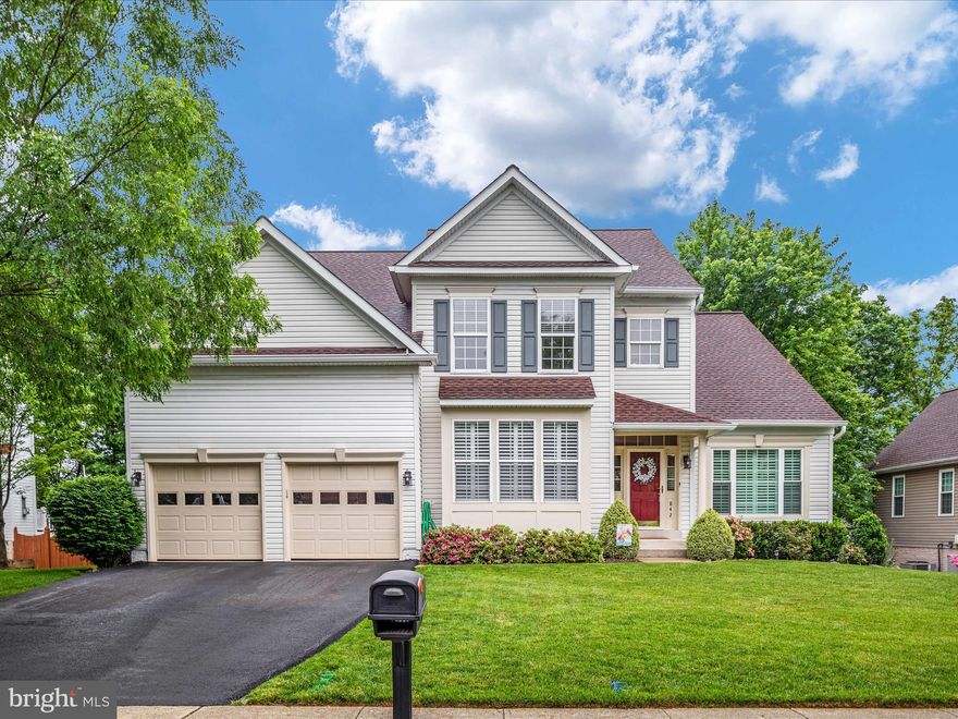 Welcome Home to 842 Macalister Drive! Beautifully updated single family home with 5 bedrooms and 3.5 baths in Tavistock Farms!  Open entry with two story foyer and grand curved staircase. Living room with vaulted ceilings opening to formal dining room - a perfect space for entertaining! Office on main level with French doors overlooking the front yard.  Hardwood flooring throughout the main level with wide louver planation shutters and custom window treatments. Updated kitchen with granite counters, tile backsplash, stainless steel appliances, open desk space, and kitchen island. Kitchen table space opens up to French doors leading to a large Trex deck overlooking the beautifully landscaped backyard.  Family room with high ceilings, stacked windows, recessed lighting, and a gas fireplace with mantle. Laundry room conveniently located on the main level at the garage entry.  Upper level includes 4 bedrooms and 2 full baths.  Primary suite offers a larger walk in closet, plenty of natural light, vaulted ceilings and a fully updated bathroom.  Primary bath features all new tile, raised double vanity with under mounted sinks, free standing soaking tub, separate shower with frameless glass enclosure and niche shelf.  Secondary bedrooms are very spacious with hallway bath featuring an updated raised vanity and tub shower. Lower level walk out basement includes all new carpet, fresh paint throughout, another bedroom, full bath, storage room, and separate room that’s perfect for an at home gym or for additional storage space.  Walk out to your spacious stone patio overlooking all of the fresh landscaping, fenced in backyard, and full irrigation system.  Conveniently located just minutes from the pool, playgrounds, walking paths, and all of the wonderful amenities Tavistock Farms has to offer! Don’t miss out on this one!!!