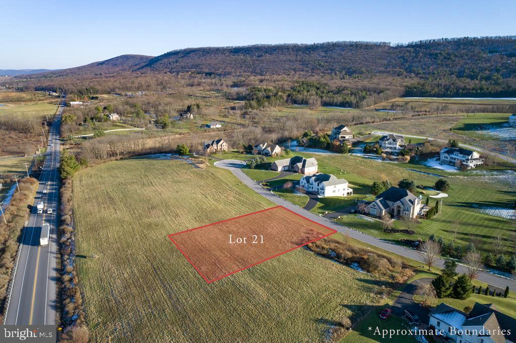 Welcome to Laurel Hills, Lot 21! Sitting at the foothills of Tussey Mountain, this large lot subdivision is one of Boalsburg's crown jewels! Bring your own builder and select one of the generous plots to design your dream home! This prestigious subdivision is adorned with large custom homes and sweeping panoramic views of Mt Nittany, Tussey Mountain, and Happy Valley. Easy access to I-99 to Lewistown and Mount Nittany Hospitals. Just a short walk to Rothrock State Forest (Hiking, Biking, Camping, Fishing), Tussey Mountain Ski Area (Skiing, Restaurants, Music, and Activities), and just minutes to Mountain View Country Club, Historic Boalsburg, Penn State Campus, and Downtown State College.