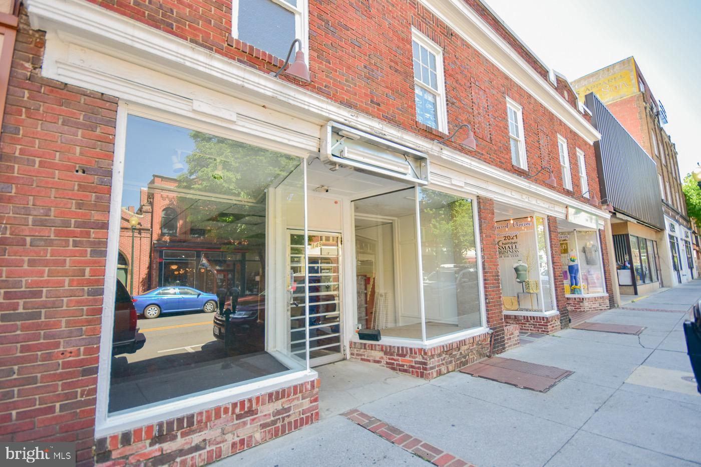 Welcome to the commercial space for lease at 149 N Queen Street, a remarkable opportunity offering 2400 sq ft of space that is available immediately. The expansive interior space provides ample room for various operations and is adorned with stunning hardwood floors, adding a touch of elegance and warmth. Adding to the charm, a portion of the ceiling features a tin design, creating a unique and visually appealing element.
This space is well-equipped with a storage room and a bathroom, providing convenience and functionality for both staff and customers. The storage room offers a dedicated area to keep supplies and inventory organized, while the bathroom ensures comfort and accessibility for everyone.
A standout feature of this commercial space is the huge display windows that adorn the front, allowing for ample natural light to flood the interior. These windows present a fantastic opportunity for showcasing products or creating an inviting atmosphere for potential customers. The flat roof provides additional flexibility for potential outdoor seating or rooftop installations, depending on the needs of your business.
Situated on the highly desirable 100 N Queen Street block, this location benefits from a significant amount of foot traffic and exposure. The bustling area ensures that your business will be seen by a wide range of potential customers, increasing the likelihood of attracting new clientele and driving sales.
With its prime location, spacious interior, and attractive features, this commercial space is perfect for a restaurant. The ample square footage allows for creative layout possibilities and the opportunity to create a welcoming and comfortable dining experience. Whether you're an experienced restaurateur or an aspiring chef, this space offers the ideal setting to bring your culinary vision to life.
