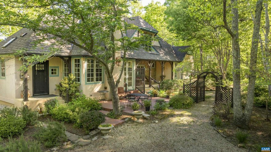 Set on 34.5 acres in Albemarle County, this custom Timberpeg hybrid home is a private retreat built for both work and play. Vaulted timber-frame ceilings, arched windows, and a travertine fireplace bring European-inspired style, while the chef?s kitchen?with arched cooking hearth, travertine sink, and island?anchors the main living space. Flexible interiors include a loft, studio above the garage, and a spacious lower level with full walkout, perfect for a gym, gaming setup, or creative workspace. Outside, trails wind through woods and past a spring-fed pond, while stone patios and landscaped gardens provide places to unplug. A separate log cabin guest house welcomes friends or serves as a private crash pad. The barn offers paddocks and pasture for horses, but with high-speed fiber internet, it also doubles as a large office, workshop, or start-up hub. Remote yet connected, this property blends total privacy with modern infrastructure?ideal for anyone seeking a self-sufficient base close to the James and Rockfish Rivers, with added value through division rights and forestry-use tax advantages.,Maple Cabinets,Solid Surface Counter,Fireplace in Kitchen,Fireplace in Living Room