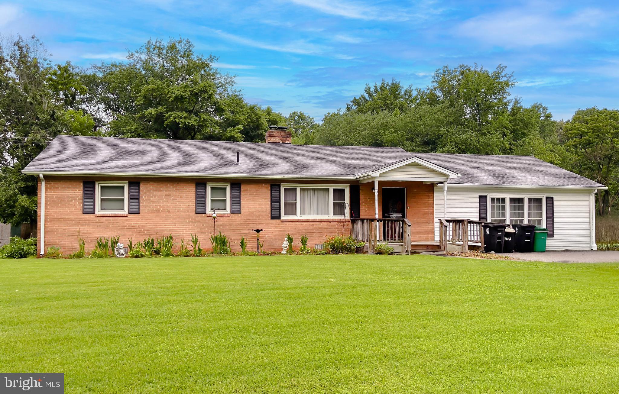 An incredible estate sale opportunity awaits—featuring not just one but two properties available for one price!! This is a standout chance for investors, home builders, and visionary homeowners to secure an established home plus a buildable 2.84-acre lot next door—all without the restrictions of an HOA. Imagine the potential: develop a second home, workshop, or garage, create a multigenerational living arrangement, or simply enjoy extra space for future projects and investments.
The charming rambler-style home, situated on nearly an acre of beautifully usable land, this charming rambler-style home is is your gateway to comfort, functionality, and endless potential! Boasting an impressive 2,054 square feet of living space, this home delivers a layout that’s as practical as it is inviting. With 3 spacious bedrooms, 1.5 baths, and a cozy living room complete with a fireplace perfect for those relaxing evenings, you’ll feel at home the moment you step inside. Add to that a large family room and a classic kitchen just waiting for your personal touch, and you’ve got a space that’s truly ready to shine. Step outside and you’ll find a covered deck made for entertaining or savoring peaceful mornings surrounded by nature. The expansive lot offers room for all your outdoor ambitions. And with a graceful slope at the rear of the property, the picturesque charm of this home just keeps on giving.
Located just outside the Beltway, you’ll have quick access to Washington, D.C., while retreating to your peaceful oasis at the end of each day. With no HOA to limit your vision, you’re free to build, invest, and grow on your own terms. Whether you’re searching for a smart investment, a future-building project, or a property with real flexibility, this rare offering has it all—reach out today and seize your chance to own two properties bursting with potential!