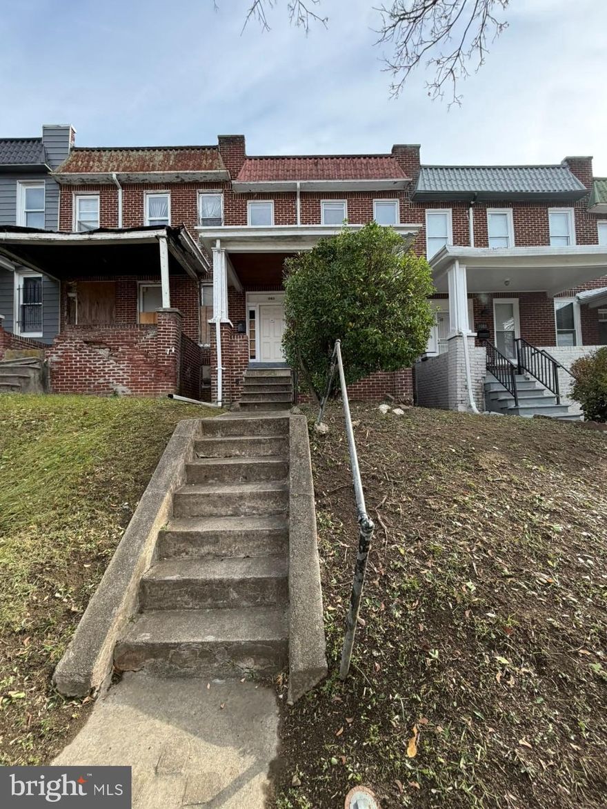 Come view this large and much light filled home located close to nearby attractions such as Gwynns Falls Park, Walbrook Junction Shopping Center, Leon Day Park, West Baltimore MARC Station, Coppin State University, & Mondawmin Mall. It is also within easy access to major traffic arteries such as Edmondson Ave and North Ave. Home is located on a quiet street yet close to everything. When you walk through the door, you’ll notice all the space and open concept with an easy flow from the living room to the dining room and into the kitchen. Next to the dining room is a small room leading to the kitchen and will be great for multipurpose usage, such as a computer desk or children’s toy room. Upstairs you will find 3 nicely sized bedrooms and a full bath. Go downstairs to the basement where you will see endless possibilities to complete this partially finished basement to add a rec room or other desired living space.  Enjoy the covered front porch and the fully fenced yard.