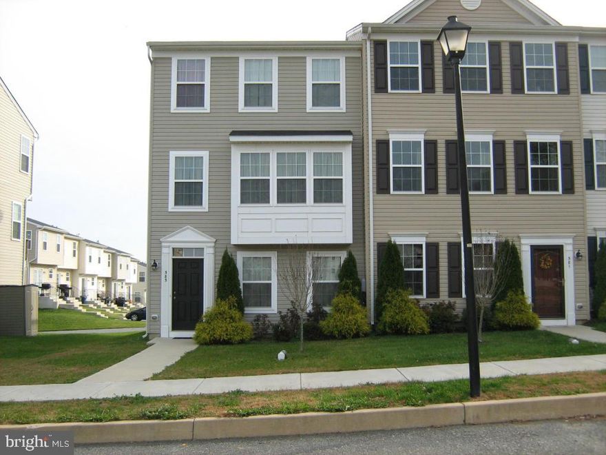 End of row townhouse in like-new condition. Quiet edge of development. Original owner. Great light brightens open floor plan. Laundry on main level. Full finished 2 car garage. Move in ready. Homeowner Association covers common areas, community center with fitness area and event reservations, and playground.