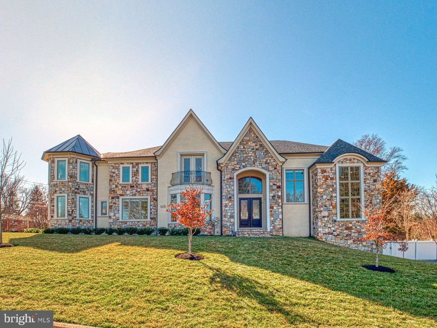 Fully customized, French country estate with over 10,740 finished square feet. Perfectly situated on a nearly half-acre lot with 7 bedrooms, 7 bathrooms, and 1 half bath. Oversized 4-Car Garage with Brand New Epoxy flooring, big enough for a pickup Truck. With Electrical Car Wall Charger; Elevator Rough-In, Immediately ready for a new Elevator when necessary; The interior design features beautiful custom moldings, multiple built-ins, 5-inch hardwood floors on the main and upper levels, tray ceilings, coffered ceilings, and 3 fireplaces. The main floor entry is a stunning 2-story Foyer Entrance. The main floor also boasts a Chef's Gourmet Kitchen, Caterer's Kitchen, and a Breakfast Area with a cozy Family Room. The two-story home office is perfect for working from home! The Second Level features a wonderfully designed master bedroom suite with a covered balcony and a master bathroom with a heated tile floor. The Lower Level includes a Secondary office with a separate driveway, as well as a generous recreation area, Wet Bar with Wine Cellar, Gym, and a fully-equipped Theatre media room with tiered seating - an entertainer's dream! The Lower Level also features a bedroom and full bath. Enjoy the warm weather in the big outdoor living space that includes a Heated Pool and expansive Deck and Patio.