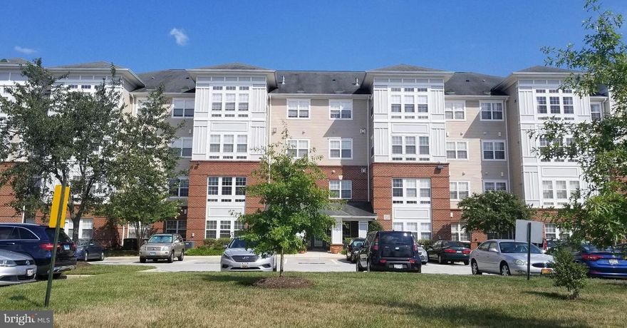 Gorgeous community over 55.  2 bed, 2 bath unit, Updated kitchen with granite top and Stainless Steel appliances. Separate dining and living room w/fireplace.  Sitting area, wood floors throughout, freshly painted. Community pool. Close to beltway and metro.
