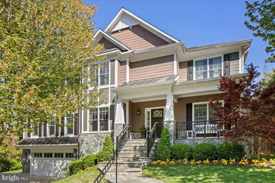 This is the home you’ve been waiting for! Absolutely stunning inside and out! Nestled just off Chesterbrook with convenient access to McLean, Washington, DC, and North Arlington, this gorgeous Craftsman-style residence is sunny, warm, and filled with welcoming charm. With 5 spacious bedrooms and 4.5 beautifully appointed bathrooms, this home was designed for both grand entertaining and everyday comfort. Step onto the inviting slate front porch and into a gracious entry foyer that sets the tone for the rest of the home. The formal living room flanks the foyer and opens to the formal dining room — ideal for elegant gatherings or cozy dinners. Just off the entry, behind glass French doors, is a handsome study featuring floor-to-ceiling built-ins, perfect for working from home or enjoying quiet moments. At the heart of the home lies an exceptional open-concept living space that includes a gourmet kitchen, sunlit breakfast room, expansive great room, and a screened-in porch. The kitchen is a showstopper: sleek white cabinetry, gold accents, generous countertops, an oversized island with bar seating, and a walk-in pantry. The adjoining breakfast area opens to both the rear patio and the screened porch, creating a seamless indoor-outdoor flow ideal for dining and relaxing. The great room is both spacious and inviting, with a tray ceiling, gas fireplace, custom built-ins, and a stylish bar, perfect for movie nights or game day gatherings. Upstairs, the luxurious primary suite awaits beneath another tray ceiling, anchored by a cozy gas fireplace and serene sitting area. A dream-worthy walk-in closet and spa-inspired bath complete this retreat, featuring dual vanities, dual water closets, a soaking tub, and a glass-enclosed dual-head shower with bench seating. Three additional bedrooms complete the upper level: one with its own en-suite bath, and two sharing a Jack-and-Jill bath with separate vanities. A sunny and spacious laundry room with ample storage makes day-to-day living effortless. The finished lower level offers even more flexible living space with walk-out access to the rear yard and patio. Highlights include designer lighting by Visual Comfort, Urban Electric, and Oly Studio, a home gym, a guest or nanny suite with full bath, a second large entertaining area with fireplace and wet bar, and built-in storage. A mudroom connects to the two-car front-load garage, and there’s even a mechanical room that can double as a crafting or workshop space. Professionally landscaped, meticulously maintained, and completely turnkey, this home is the perfect blend of elegance, function, and comfort. Welcome home.