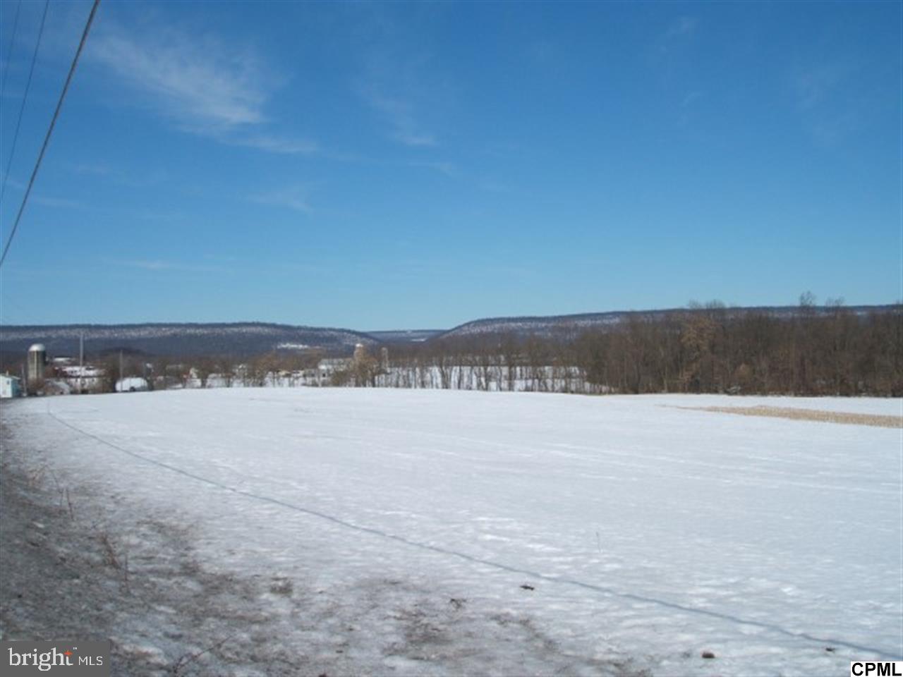Vast property bordered by serene creek on 2 sides offers both substantial farmland & peaceful natural wooded areas. Easy access to Rts 22, 81, & 78. Close to Indiantown Gap & Memorial Lake State Park amenities. Property currently enrolled in Clean & Green. Barn and outbuildings could be rehabbed or razed. Silo still in use.