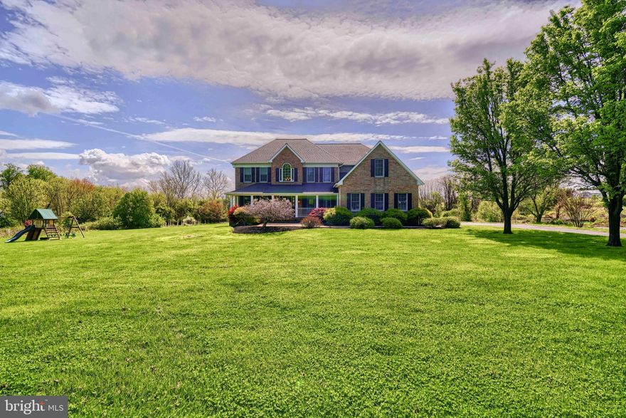 Welcome Home!!! Drive up the tree lined driveway to this beautiful ALL brick home situated on 4.42 acres! This beauty offers 4 spacious bedrooms, 4 full and 1 half bath, 3 car garage, and finished basement. Welcoming you into this home is a 2 story foyer exposing the living room and dining room. Down the hall you will find a lovely family room  with stone fireplace and lots of windows bringing in natural light.  The kitchen is bright and cheery and has white cabinets, granite counter tops, walk in pantry and stainless steel appliances. French doors lead you to the massive trex deck overlooking flat backyard.  Another great feature to the first floor is an office right off of the family room. There is also a full bath on the main level.  The second staircase off the family room and kitchen lead you to the bedrooms and laundry room. Spacious primary suite has a tray ceiling and ceiling fan, updated bathroom (6 years ago) and a HUGE walk in closet. The second bedroom offers a full bath and ceiling fan.  The 3 and 4th bedrooms have a Jack and Jill bathroom.  The basement is finished and has another family room with pellet stove, game room and half bath. The roof is 8 years old, water heater is 5 years old and the furnace is 7 years old.  Great house in a great neighborhood and comes with a 1 year warranty.
