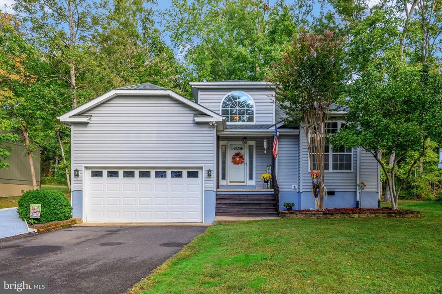Welcome to 1212 Lakeview Pkwy! This meticulous, move in ready home will wow you! From the moment you arrive, you will know it's the one! The inviting foyer flows effortlessly into the living room, featuring a corner gas fireplace and cathedral ceilings. The incredible updated kitchen with granite countertops is sure to please. Off the kitchen is the dining area that opens to the living area for entertaining ease, and that's only the beginning! The owner's suite is spacious, full of light with a bay window and window seat, oodles of closet space and an en-suite bath with a double vanity.   The sunroom is absolutely stunning and full of natural light.  The massively oversized two-car garage is perfect for storage or a shop area. Relax on your deck while enjoying the sounds of nature. Enjoy the level yard to garden, entertain, or create your own oasis!  Get your lake life started today! A private, gated, secured community, Lake of the Woods offers anything and everything you could possibly want. Home to two lakes (the 550 acre main lake and a 35 acre "fishing lake"), a golf course, an equestrian center, a fire and rescue department, and a church all within the gates, Lake of the Woods simply has it all. Whether your passion is boating, water skiing, kayaking, golfing, horseback riding, or simply taking in the breathtaking views from the clubhouse while enjoying a fabulous meal, from your own deck or yard, or from one of the beaches, you won't be disappointed! Perhaps you'd like a game of bridge or volunteering your time and talents...Lake of the Woods offers more than 60 clubs and/or organizations from which you may choose to become involved. Located in Orange County, we are fortunate to enjoy low real estate taxes. Coupled with home prices ranging from the mid $200,000s to over $2,000,000, Lake of the Woods is the perfect community for both full-time residents, as well as weekenders. But don't take my word for it, please come see for yourself! I will gladly give you a tour of Lake of the Woods by boat and by car so that you may experience why I love Lake of the Woods!