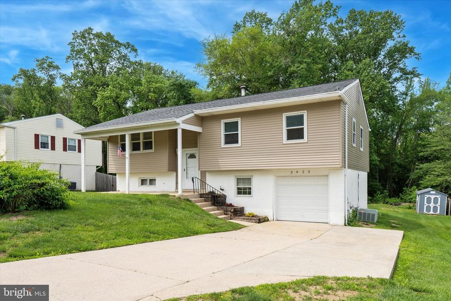 Welcome to 2425 W Colonial Dr, Upper Chichester, PA!
This beautifully updated 4-bedroom, 2.5-bath single-family home is the perfect blend of comfort, space, and convenience. Nestled in a desirable neighborhood, this property offers exceptional curb appeal with an attached garage and a large driveway providing plenty of parking.

Step inside to find a bright and spacious layout designed for modern living. The home features generous room sizes, updated finishes, and plenty of natural light throughout. The heart of the home opens up to a massive bi-level deck in the rear—ideal for outdoor entertaining, weekend BBQs, or simply relaxing in your private backyard retreat.

Located in a fantastic area close to schools, parks, shopping, and major routes, this home offers the perfect balance of suburban tranquility and everyday accessibility. Don't miss your chance to make this move-in-ready gem your own!