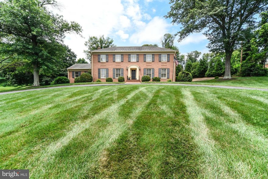 If you're looking for a pool and tennis court in an idyllic setting, you've come to the right place! Located on two beautiful rolling acres, the house is situated atop a knoll with a sweeping circular driveway.  Custom built by the present owners, the home features all brick construction, a circular driveway, a side entry two car garage with additional parking pad and a "user friendly" floor plan.