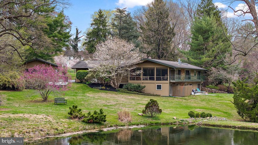 Welcome to 110 Windward Road, a stunning contemporary residence nestled in the serene landscape of Greenville. This exquisite home was built by renowned local custom home builder, Jack Alexander, who was known for his mid-century modern designs that were built to be in harmony with the land rather than change the land for the home. Mr. Alexander took extra care in building this home as it was where his personal residence for several years. This stunning home offers a harmonious blend of modern design and spacious living, perfect for those who appreciate both style and comfort.

Spanning 4,225 square feet, this home features 3/4 generously sized bedrooms and 3.5 luxurious bathrooms including a main floor primary bedroom suite, ensuring ample space for relaxation and privacy. The open-concept layout is accentuated by sleek lines and abundant natural light, creating an inviting atmosphere throughout.

Step inside to discover a thoughtfully designed interior. The expansive living areas are ideal for entertaining, while the contemporary kitchen boasts high-end finishes and ample storage, catering to the culinary enthusiast.

The walk-out lower level offers additional versatile spaces, perfect for home office, gym, or media rooms, adapting to your lifestyle needs. Outside, the property extends over 5 1/2 acres with a pond and backing to Mount Cuba conserved land, offering a private oasis for outdoor activities and serene relaxation.

The property boasts an attached two-car garage, providing convenient and secure parking. Additionally, a versatile detached studio offers endless possibilities for customization. Whether you envision transforming it into an additional two-car garage or utilizing it as a home office, art studio, or creative workspace, this flexible space adapts to your unique needs and lifestyle.

This home is a true gem, combining modern amenities with timeless elegance. Whether you're hosting gatherings or seeking a peaceful retreat, 110 Windward Road provides the perfect backdrop for your next chapter. Experience the best of contemporary living in this exceptional Greenville residence.