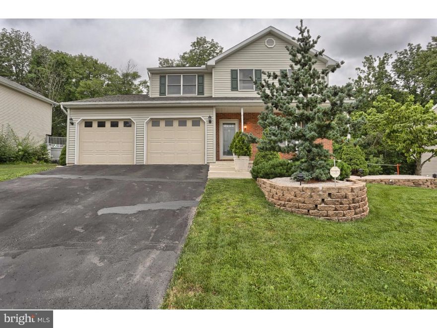 This truly magnificent 3-bedroom home is move in ready.  As you walk in to the home, you'll find beautiful hardwood floors in the living room and dining room which flows into the tiled kitchen and don't forget to check out the granite countertops.  Beyond the kitchen you will find a family room with fireplace and a patio door that flows to the outdoors where you will find a separate covered patio giving you the feel of an island paradise.  The upstairs you will find three large bedrooms.  The master bedroom has own private bath and walk in closet.  The lower level of the home offers a large second family room all wired for all your movie entertainment oh and did I mention the built in bar.