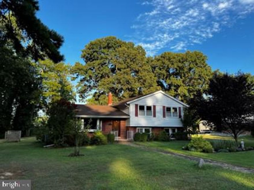 Spacious 4 level split with  some winter water views. North Shores is a water priviledge community .  Home has 3 good size bedrooms and plenty of storage. Main level has bright living room featuring a big bay window and dining room with french doors leading to back deck.  Lower level offers full bath with laundry room, the large family room showcases a  gas fireplace and has french doors leading to the rear yard and access to the driveway. Venture down to the basement where there is plenty of space, storage and workshop area. Enjoy the numerous North Shore community amenities including a marina with boat ramp, beach, park, playground and events.  20 minutes to BWI Airport!