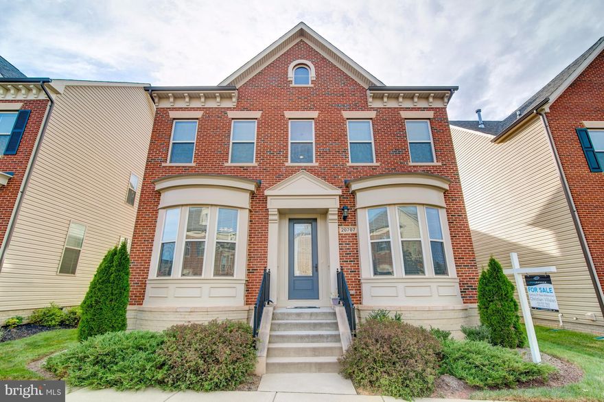 Pristine 5BR/4BA home in sought after One Loudoun! Main level gleaming HW floors, BR, full BA. Open gourmet kit w/large island, eat-in seating, granite counters, 6-burner stove, SS appliances. Recess lighting all levels. Master BR, walk-in closet, BA w/soaking tub, sep shower. Attached 3-car rear loading garage w/extended driveway. Fresh paint, new carpet. Walk to shopping, dining & entertainment!