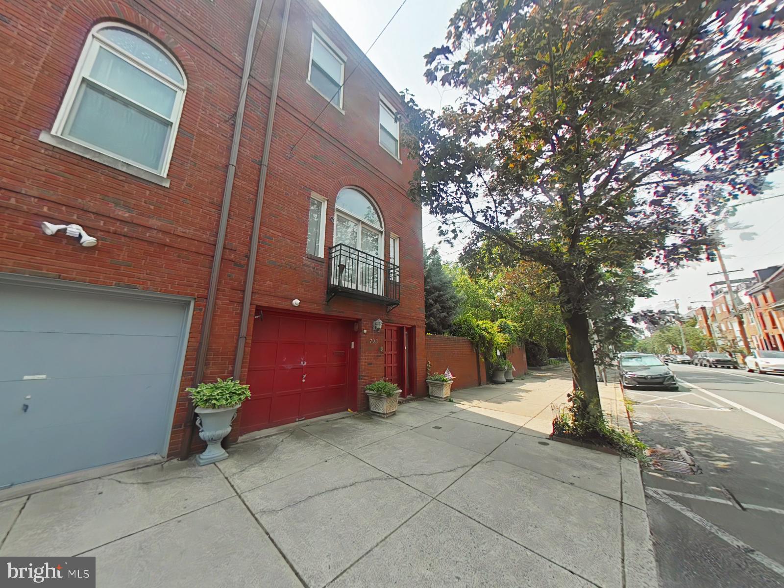Welcome to this charming, solid brick end-unit townhouse, ideally located in the heart of Queen Village and within the highly sought-after Meredith School District.
Offering 3 bedrooms and 3 full bathrooms, this unique residence delivers exceptional city living. Connected to the property is a private, brick-enclosed garden oasis with an in-ground pool—a rare find in city homes. This home is also equipped with a one car attached garage making parking in center city a breeze.
Down just half a flight of stairs, you'll find a versatile space ideal as a guest suite, private bedroom, or recreation room. This space is complete with its own ensuite bath for the ultimate convenience. On the main level is where you will find the spacious eat-in kitchen, outfitted with stainless steel appliances. There is tons of cabinet and countertop space for all sorts of culinary activity making this every chef's dream! Just outside of the kitchen you will find the private back yard oasis which is rarely found in the city! Included in this outdoor space is your very own in ground pool to enjoy during those hot summer days to stay cool. Adjacent to the kitchen is the large living room with soaring 20-foot ceilings, marble tile floors, and a double-sided wood-burning fireplace, creating the ultimate entertainment space to host friends and family.
Continuing upstairs to the next floor you will find the first bedroom and a full bathroom equipped with a washer and dryer. On the next floor above is where the other two spacious bedrooms are found. The main bedroom has their own wood burning fire place right in the room along with a small kitchenette. Right next to the main bedroom is the full bathroom on this floor which boasts a jacuzzi jet tub and floor to ceiling tiles exuding elegance. Natural light floods this room coming through the large windows right above the tub creating a cozy atmosphere and spa like feel.
Topping it all off is the roof deck offering unmatched 360° views of the city skyline, I-95, Penn’s Landing, and the New Jersey waterfront.
A 13-month HWA home warranty will be included with acceptable offer. This must be included in the Agreement of Sale. There are also 3 additional parking spaces in the rear of the property for off street parking.
No need to look any further, this gem is a once in a lifetime opportunity. Where else will you be able to find an in ground pool right in center city? If you are looking for your dream home, this is the one for you!
Don't miss this opportunity to own this incredible property—call and schedule your visit today!