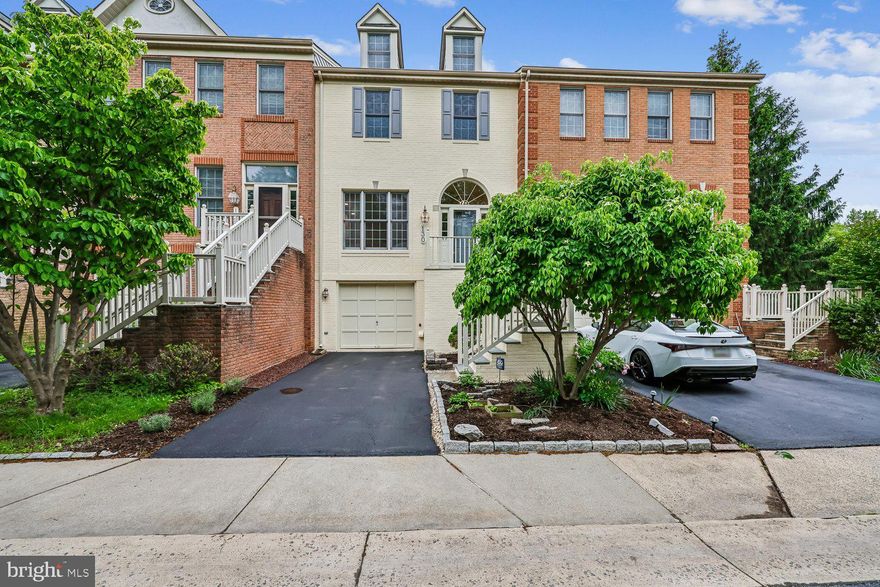 OPEN SUNDAY 1-4PM.  Spectacular, 3BR/3.5BA, painted-brick, 1-car garage townhouse in Rose Hill Falls on PREMIUM LOT backing to private conservation area with an abundance of parking in front.  Built by the Magruder Companies, this home spans over 2,400 sq. ft. of living space across three levels and has been recently remodeled to provide move-in comfort.  Special features include newly refinished oak hardwood flooring on the entire main level; new designer carpeting throughout upper and lower levels; 9-ft, 10-ft, cathedral, and vaulted ceilings; custom painting; remodeled kitchen and baths; elaborate chair rail and crown molding; recessed and upgraded lighting throughout; new upgraded door hardware and hinges; composite deck with flagstone patio underneath overlooking fenced rear yard.  Brick and flagstone stairs leads to front door with side transoms, Palladian window above, and full glass storm door; marble foyer entrance with new chandelier; formal living room with recessed lighting and remodeled marble powder room; formal dining room with new chandelier and newer full-view French doors to maintenance-free composite deck with privacy panels; remodeled kitchen with quartz countertops, stainless and black appliances, quartz island/breakfast bar with stainless cooktop, ceramic tile backsplash, recessed lighting, pendant and under cabinet lighting; family room off kitchen with floor-to-ceiling stone fireplace with wood mantel, flagstone hearth. ceiling fan, and newer full-view French doors to deck; upper level primary bedroom with vaulted ceiling, ceiling fan, and walk-in closet; primary bath with vaulted ceiling, skylight, ceramic tile flooring, double vanity, widespread faucets, Jacuzzi whirlpool tub, separate walk-in ceramic tile shower with glass enclosure, and private water closet; two additional bedrooms on the upper level each with vaulted ceilings and double door closets; hall bathroom with LVT flooring, double vanity and ceramic tile tub/shower; hallway with cathedral ceiling, skylight and recessed lighting brings tons of natural light; walk-out lower level with recreation room with recessed lighting and newer French door to flagstone patio and  private fenced back yard backing to a conservation area, full bath with LVT flooring, ceramic stall shower, and glass shower enclosure; laundry room with bonus walk-in storage closet.  Architectural shingle roof (2010), new HVAC (2025), and new 73-gallon water heater (2025).  Without leaving the neighborhood, there are over a mile of bucolic walking/bike paths, forested conservation areas, sidewalks, two tot lots, a private tennis court, and a basketball court.  Adjacent to the development sits the City of Rockville's Bullard Park at one end of the neighborhood and all of the sports fields, track, and tennis courts of Julius West Middle School on the other side.  Be part of the vibrant Rockville Town Center featuring shopping, fine restaurants, sidewalk cafes, the Rockville Regional Library, Regal Cinemas, and other entertainment and cultural facilities.  Less than a mile from the Rockville Metro (Red Line) for those looking to commute via mass transit.