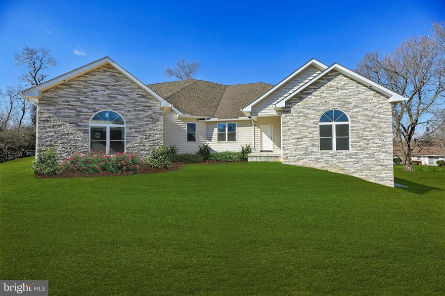 OVER 10,000 Total Square Footage!!! Experience unparalleled luxury in this newly constructed 10,000 square foot custom home, designed for modern living and grand entertaining. Boasting an expansive open concept floorplan, six bedrooms and six and a half baths, this home offers abundant space and refined comfort. Sunlight streams through energy-efficient vinyl windows with Corian sills, illuminating the fresh luxury vinyl plank flooring and recessed lighting throughout. The chef's kitchen, complete with custom cabinetry and a sunlit breakfast nook, seamlessly flows into the magnificent great room. A main-level primary suite, along with two additional bedrooms with ensuite baths, provide ultimate convenience, while an office and bonus room cater to diverse needs. Upstairs, two more bedrooms with ensuite baths and a second bonus room await. Enjoy year-round comfort with two-zone geothermal heating and cooling (save upwards of 60% on your electric bill!!), and endless hot water from the tankless system. A 1,000 square foot attached garage, walk-in attic and unfinished walk-out lower level, pre-plumbed and wired, offer endless possibilities. Step outside to the patio and expansive deck and appreciate the peace of mind provided by this private, expansive property. This is more than a home; it's a lifestyle.