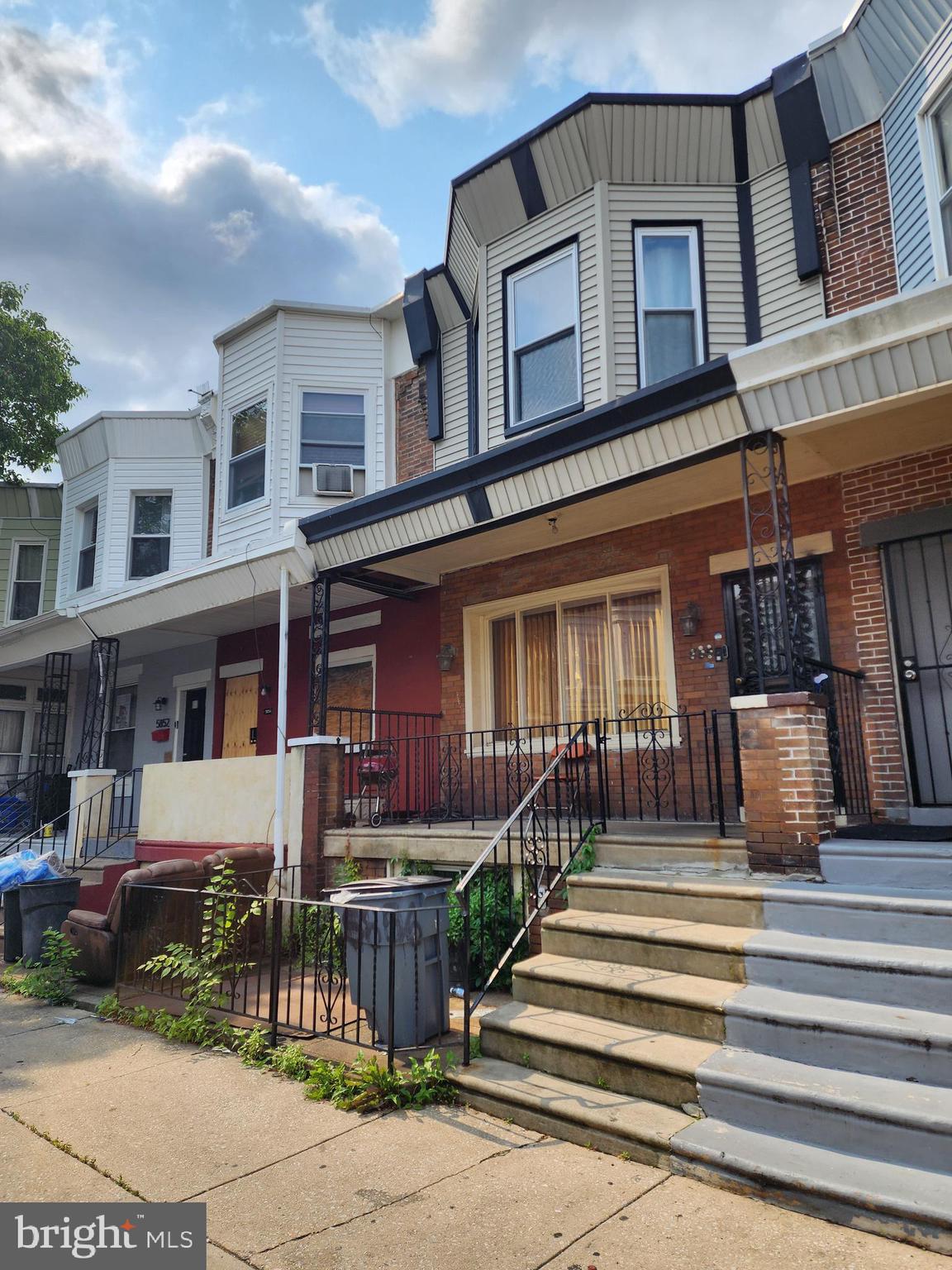 Nestled in the heart of Cobbs Creek of West Philadelphia, this RM1-zoned property offers exceptional potential for investors and savvy homebuyers alike. Featuring and open front porch, three bedrooms, one and a half bathrooms, and a finished basement, this spacious home is ready for your personal touch or next renovation project. Inside, you'll find a generous living room, a separate dining area, and a nice-sized kitchen with a mud room—providing a solid foundation for creative updates and value-add improvements. Whether you're looking to fix and flip, expand your rental portfolio, or renovate and occupy, this is a versatile opportunity in a growing neighborhood. Please note: This is an estate sale and is being sold strictly “As-Is, Where-Is.” The seller will make no repairs. Bring a flashlight-the electric is not turned on. Don’t miss out—schedule your showing today and explore the potential of 5856 Walton Avenue!