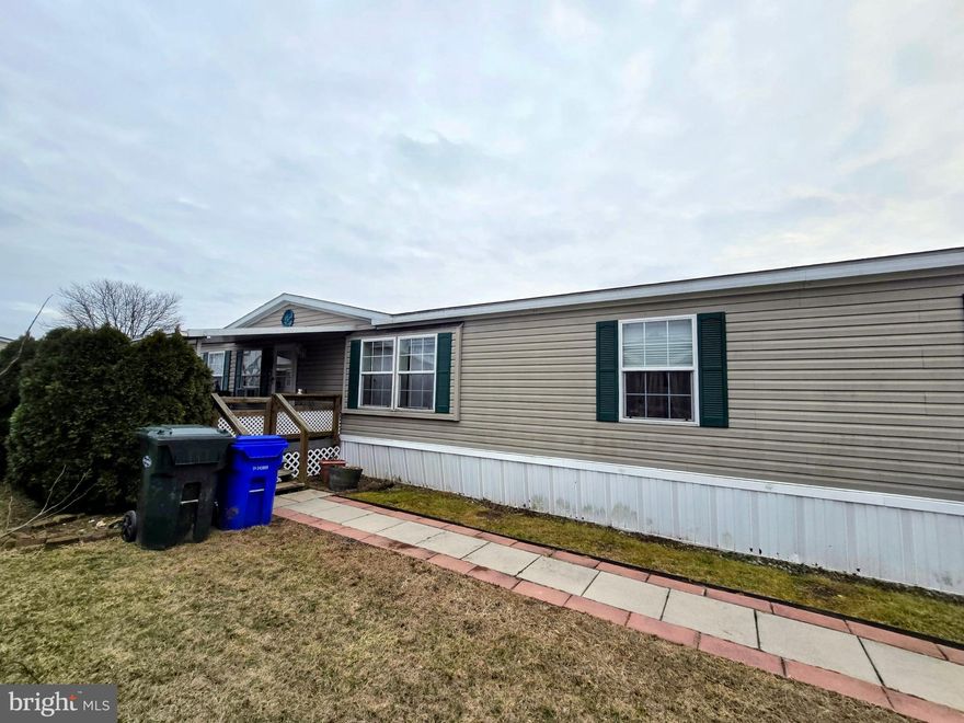 Home for sale in Walnut Grove Community Upper Adams School District. This home features 4 bedrooms, 2 bathrooms, dining room, large kitchen with island, covered front porch and back deck. The back deck needs some boards repaired. Home being sold as is. Lot rent includes water, sewer, trash and snow removal on roads. Easy commute to local restaurants and shopping. Schedule your showing today!