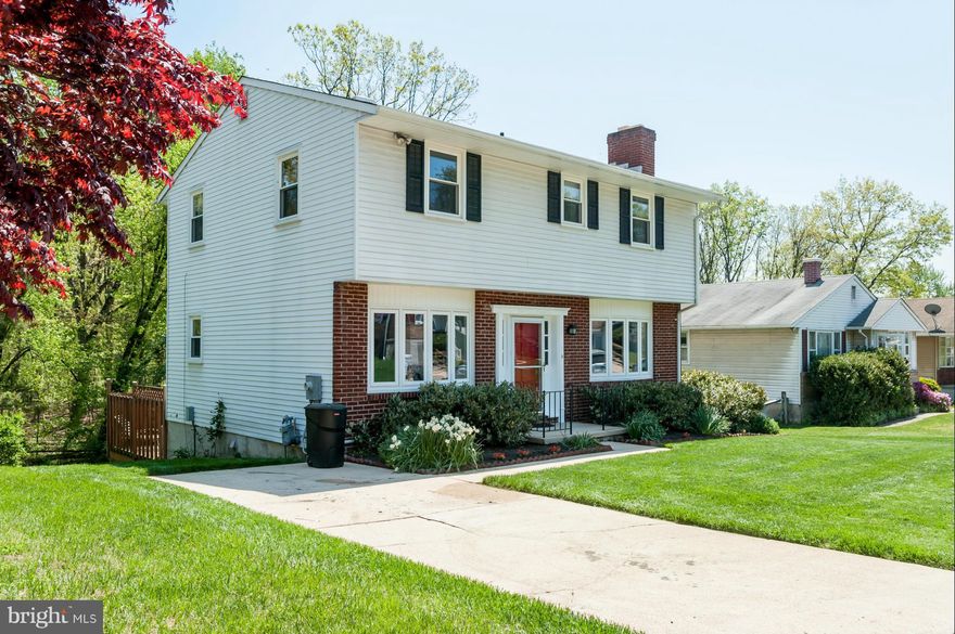 This fantastic home is bright, spacious & sparkling clean . 1st floor consists of sprawling living room with wood flrs & brick FP, dining room w/ chandelier & eat-in kitchen w/ updated appliances. There's also a family room/den which opens to a dual level deck. 2nd floor has 4 good-sized bedrooms along w/ 2 updated baths. Lower level is walk-out w/new carpet & a FP. Home backs to woods. Perfect!