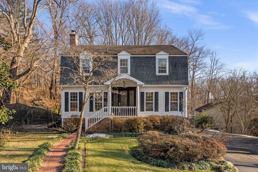***Open House, Saturday, February 28th ,1 PM - 3 PM and Sunday, March 1st, 1 PM - 3 PM***

Nestled on a quiet cul-de-sac in the highly sought-after The Dogwoods at Langley, this charming center hall Colonial offers timeless elegance, thoughtful updates & exceptional privacy.

From the moment you arrive, the lovely curb appeal, uniquely beautiful front door & manicured landscaping set the tone. Inside, sun-filled formal living & dining rooms showcase detailed molding, beautiful hardwood floors, custom built-ins & three functioning fireplaces that add warmth and character throughout the home.

The inviting family room features a cozy fireplace, built-ins & a wet bar, opening to a spacious deck overlooking the backyard ideal for entertaining, relaxing or play. Backing to Fort Marcy, the setting feels wonderfully private. The tastefully renovated kitchen offers stainless steel appliances, abundant cabinetry & a dedicated desk or office nook with a bay window overlooking the backyard, perfectly suited for everyday living. A two-car garage & irrigation system add ease and convenience.

Upstairs, the spacious primary suite is a true retreat with dual walk-in closets & dual vanities. The finished walk-out lower level provides exceptional flexibility, featuring a fireplace, two additional bedrooms & a full bath perfect for guests, multi-generational living or a private workspace.

Residents enjoy access to two neighborhood tennis courts within a community where opportunities are rare because neighbors love to stay. Ideally located just minutes to downtown McLean, Tysons, Washington, D.C., Reagan National Airport, GW Parkway & I-495. Enjoy nearby Turkey Run Park & Scotts Run Park, offering scenic trails to the Potomac River, Chain Bridge & the C&O Canal.

This home offers a rare combination of privacy, space, charm & location in one of McLean’s most desirable neighborhoods served by award winning schools.