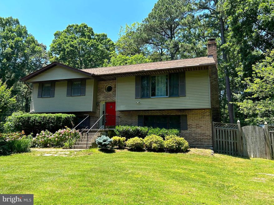 This is a gorgeous split foyer house spotless and ready to move in!!  Large table space kitchen w breakfast bar. Separate dining room w door to lovely screened in porch.  Large living room and two bedrooms up w two full baths. Lower level has a family room w wood stove and two bedrooms with a rough in for a third bathroom.  Lots of storage space in laundry with a walk out to the driveway.  Lots of space and a beautiful house waiting for you. The lot is a double lot w a huge fenced backyard w shed.  All this and lots of privacy too.