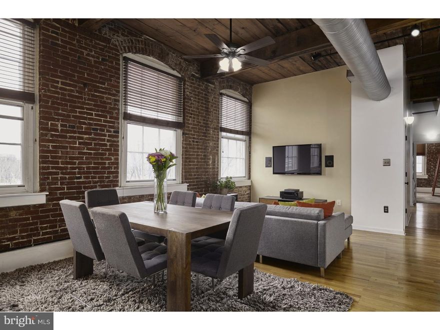 Enjoy oversized windows and exposed brick throughout every room of this 2 bedroom, 2 bath full floor residence. Old City industrial timber ceilings paired with modern luxuries. Sleek modern kitchen with stainless steel appliances, granite counters and breakfast bar overlook an open dining space and living room. Master suite complete with custom closet featuring gracious West and North views from the large windows. Charming second bedroom and bath, excellent closet space and new washer/dryer. Fantastic Old City location steps from some of the city's best shopping, restaurants and galleries. Public transit, bridges and highways all close by! Indoor parking options available next door.