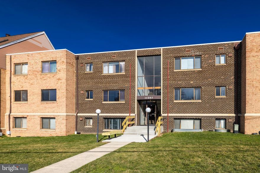 THIS IS UNIT 202 → Bright & Updated 2-Bedroom Condo Near Wheaton Metro * Welcome to this beautiful 2-bedroom, 1-bath unit in Sierra Landing. This updated condo offers 940 square feet of comfortable living, featuring new carpet, expansive windows for great natural light, and a spacious layout perfect for both relaxing and entertaining.  The galley kitchen is outfitted with modern cabinetry, updated appliances, and generous counter space—ideal for everyday cooking or weekend hosting. Both bedrooms are generously sized, each with its own walk-in closet offering ample storage. The full bath is clean and refreshed with timeless finishes.  Enjoy the ease of off-street parking (2 resident permits + 2 guest passes), secure building entry with intercom access, and community perks including a sparkling outdoor pool, landscaped common areas, and pet-friendly policies. The condo fee covers heat, gas, water, sewer, trash, parking, and more—offering exceptional value.  Location-wise, you're just minutes from the Wheaton Metro, Westfield Wheaton Mall, Safeway, Costco, and an abundance of shops and restaurants. With parks, trails, and libraries nearby, this is a prime spot for anyone seeking convenience, community, and comfort.  Whether you're a first-time buyer, investor, or downsizer—this move-in-ready gem is not to be missed!