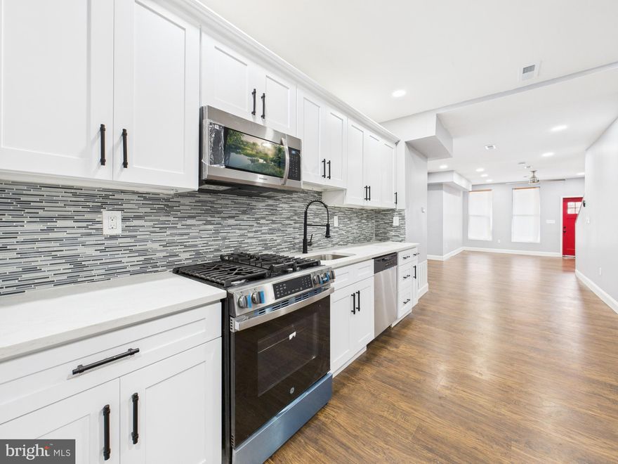 Fully Renovated End-Unit Townhome – Move-In Ready! Step into this stunning 3-bedroom, 1.5-bath townhome, fully upgraded and designed for modern living. Hardwood floors flow throughout, complemented by a sleek kitchen with stainless steel appliances. The primary bathroom features a luxurious jacuzzi tub and beautifully updated tile. Enjoy a finished basement, new HVAC and hot water heater, plus a large backyard with a brand-new deck—perfect for entertaining! Ideal for first-time buyers or investors looking to add a turnkey property to their portfolio. Don’t wait—schedule your showing today!