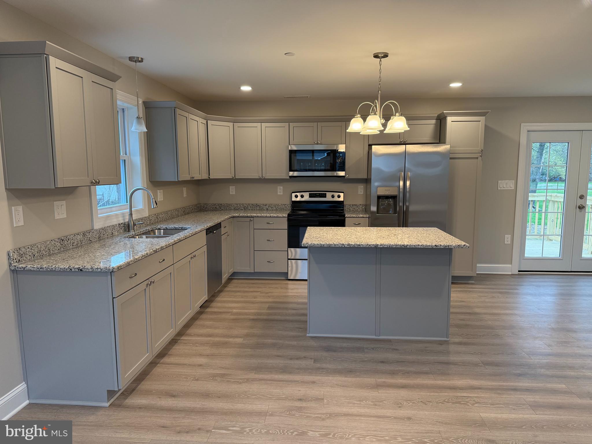 Welcome to your new home in the historic harbor town of Rock Hall! Quality new construction built with meticulous attention to detail. This 3 bedroom/2 bath home is clean and sleek with modern, tasteful upgrades and color palette. Every appliance and ammenity is brand new, from the HVAC to the bathroom vanities and recessed lighting. Any chef would be thrilled with this substantial kitchen offering granite counters, build-in cabinetry, stainless steel appliances and generous-sized center island. Stylishly appointed baths feature plumbing, fixtures and lighting. The large master bedroom has its own bathroom and a walk-in closet. 2 additonal bedrooms complete the layout. Enjoy a beverage on the 20 X 10 deck on the rear exterior. Rock Hall is a small, eastern shore community with miles of Chesapeake Bay shoreline and unspoiled wildlife. Renowned for its boating opportunities, Rock Hall also offers quaint restaurants, museums and local shops.