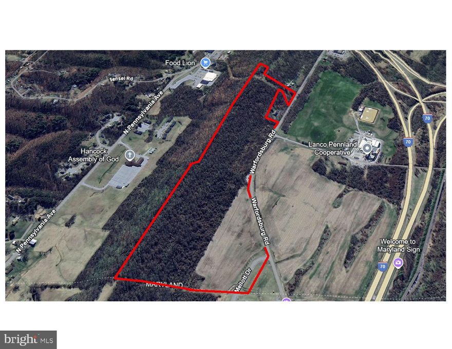 64.55 acres of undeveloped land zoned Commercial / Business General that has been annexed into the City of Hancock. In exchange for the annexation, the City has agreed to extend public utilities including water and sewer to the property at no expense to the owner. There has also been an agreement that city real estate taxes are not being charged to the owner on this property until public utilities are completed. The zoning will allow for many opportunities including, but not limited to, business and professional offices to retail sales and services. There is a chance that the zoning could be changed to Residential for the potential use of multi-unit residential dwellings etc to be built. The potential uses for this property are endless due to the easy access location at an I70 interchange and road frontage. Borders Warfordsburg Rd and sites to I70. There is an additional 64.4 acre parcel on the West Side of Warfordsburg Rd bordering I70 also for sale $2,600,000 with the same terms in regards to taxes, annexation, utilities and zoning.