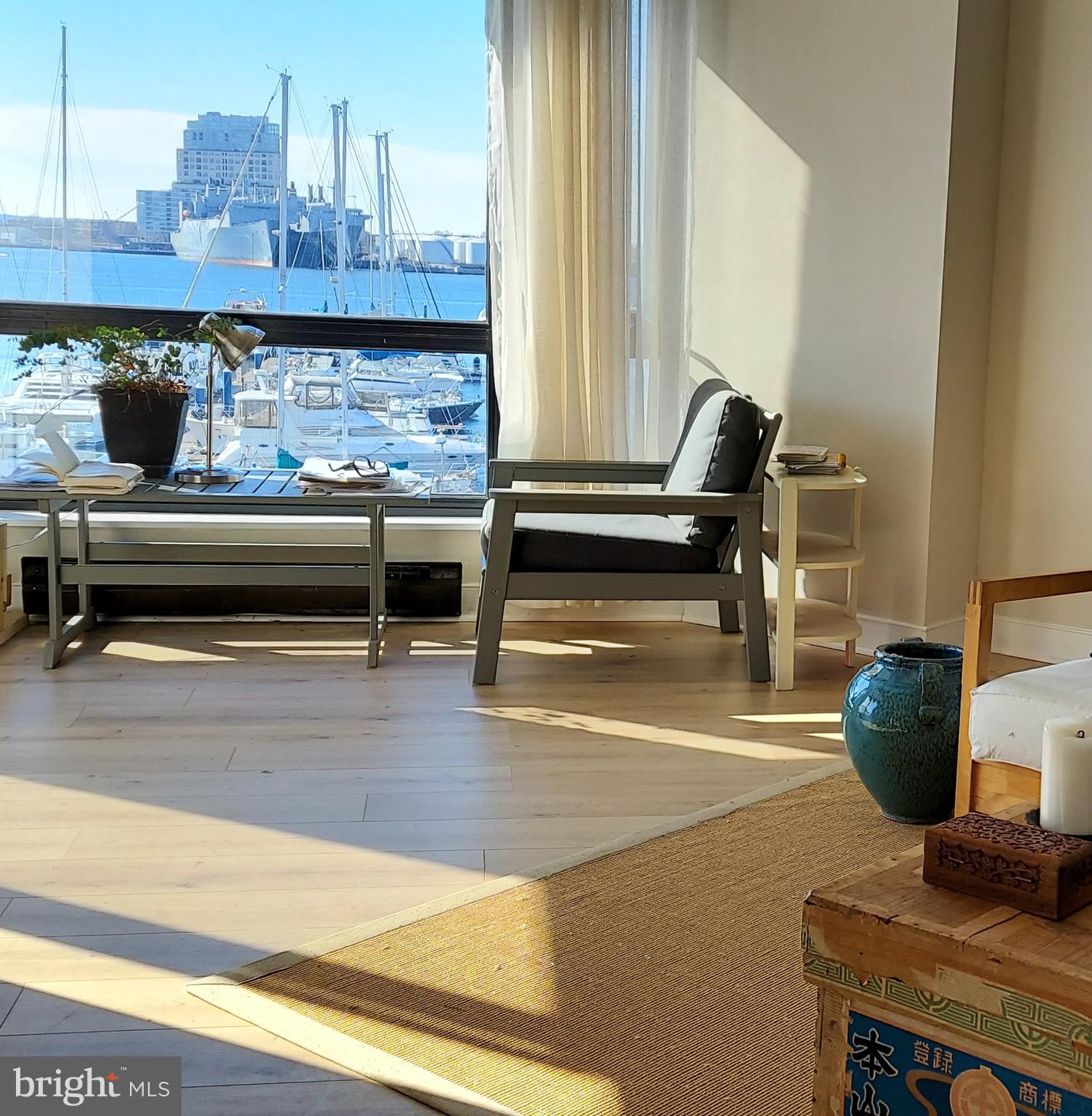 Fabulous light and water views from every room in rarely available Anchorage Tower Condominium on
the Canton waterfront. This spacious waterfront condo has two-bedrooms, each with private full baths,
a half bath in the foyer, an open floor plan, in-unit laundry room with a full-size washer and dryer, plenty
of closet space, and a separate storage room located on the same floor. It has TWO assigned parking
spots in the attached, gated garage, as well as ample guest parking for visitors. The master suite includes two large closets, a linen closet, a full bath with a whirlpool soaking tub and separate stand-up shower. The second bedroom has ample closet space, a full bath and sliding doors to the balcony. The large open kitchen has tons of cabinets, a new refrigerator, and sliding doors to the balcony. The large living/dining room area also has sliding doors to the balcony. The unit overlooks the Anchorage Marina and the waterfront promenade. The condo is full of natural light- starting with the eastern light in the morning and ending with the sunset. A beautiful and peaceful place where you can watch the activity on the river or step onto the promenade where you can enjoy the water. The building is well kept and has friendly and helpful staff that notify you when you receive packages and when visitors arrive. It has a 24-7 attendant in the lobby, a fitness room, a party/meeting room, and secure key fob access to the building, the parking garage and waterside promenade. The building is wheelchair accessible with no barriers from first floor of the garage, a no step entry to the lobby, elevators, and the interior of the unit has 30 inch doors throughout.
About the location: Canton is one of the most sought-after neighborhoods in Baltimore City and the building has an unbeatable location on the waterfront and close to everything you need. With a Walk Score of 94 out of 100 according to Live Baltimore. Directly across the street, there is a Safeway, Starbucks and shops, restaurants. Its close to Fells Point (0.8 mi), and to Canton Waterfront Park (0.5 mi) where you can hop on a water taxi to 6 different points in the Inner Harbor. The large and popular Patterson Park is less than a mile away. Many people in the neighborhood walk to The Johns Hopkins; school of public health, the hospital, and the school of social work (1.4 mi). We are also on the JHU shuttle route. The city bus also stops steps from the building and goes downtown, stopping close to the MARC train and Camden yards and M&T bank stadium.
Other Points of Interest close-by:
Shops at Canton Crossing (Target, Harris Teeter, Loft, CVS, Michaels, Nordstrom Rack) 0.9 mi
Whole Foods 1 mi
I-95 exit 1 mi
University of Baltimore 3.2 mi
Lexington Market 2.3 mi
Baltimore Inner Harbor 1.7 mi