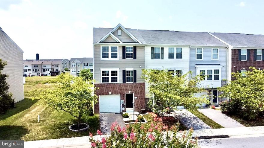 LOCATION LOCATION LOCATION! Right in the heart of Ranson’s shopping and dining nestled in the back of Fairfax Crossing! Pull up to this beautiful end unit townhome and be “WOW’d” by its curb appeal. Partial brick front, mature trees, and nicely manicured yard that’s has white vinyl fencing in the rear. Home awaits as you walk in the main level that leads back to your open Rec room, walkout lower level, and 1/2 bath. Head upstairs to the main level where LVP covers the entire kitchen and family room. Cherry tinted maple cabinets with granite counters accented with black appliances. Large composite deck off the rear making the perfect spot for summer BBQ’s. A second 1/2 bath is located on the main level for everyday convenience. Upstairs, brand new carpet has been installed on the whole level! Your two secondary bedrooms share a full bath and your owner’s suite has a generous sized walk-in closet with an upgraded closet system in place. A separate soaking tub, stand up shower, and dual sink vanities tops off this beauty!