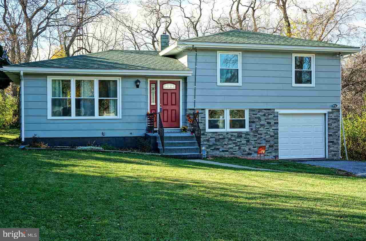 Privacy in the borough, absolutely!! Terrific home on Factory St extended (no outlet) with loads of updates & possibilities. A few of those include new windows, entry doors, remodeled kitchen (w/double oven) & remodeled baths, refinished hardwood floors, fresh paint, new vinyl soffit, seamless gutters, 100 amp service and more! Out back a huge sunroom w/patio, private yard, & dog fence too! Have a look today! This just could be the one!