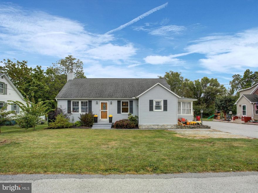 This charming 4-bedroom, 2- full bath Cape Cod offers a warm and functional layout. Nestled just outside the town limits, with three bedrooms on the main level and a private upper-level suite with its own full bath, the home is thoughtfully designed for comfort and flexibility. Hardwood floors run throughout. Features include a separate dining room and a cozy eat-in kitchen perfect for everyday meals or hosting a gathering. Updates over time include, architectural shingled roof approx. 6 years old, furnace less than 10 years old and energy-efficient replacement windows in 2012. Outdoor living shines with a screened porch and a spacious deck overlooking a semi-private rear yard—ideal for kids, pets, and weekend fun. The property also features a one-car garage, shared driveway, and is serviced by a deeded, shared well.  Enjoy being just minutes from historic Gettysburg,  Liberty Mountain Ski Resort, along with various local wineries and restaurants where you can enjoy a stay-cation anytime of year! Located near the local post office. Easy commute options in all directions while blending small-town charm with everyday practicality.  Unfinished walk-out basement  has laundry and storage. Property shows on maps for fed flood zone, however, current owner does not pay flood insurance. Showings set to begin September 25, 2025.