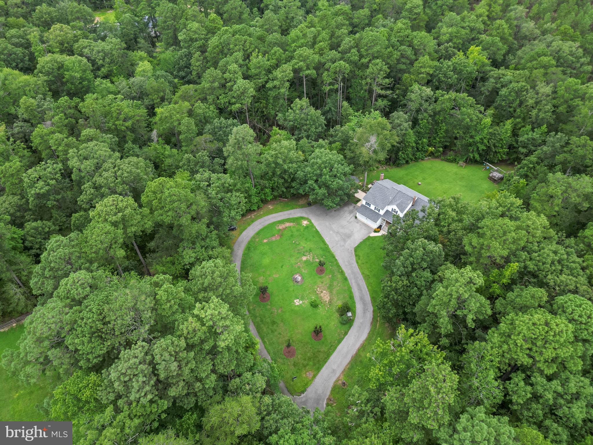 Nestled on a serene and private 3.29-acre lot—plus an additional 0.5-acre parcel—20919 Ridge Path Way offers the perfect balance of seclusion and convenience in the heart of Leonardtown. This professionally upgraded 4-bedroom, 3.5-bath home delivers both peace of mind and high-end comfort with all major systems and appliances less than 5 years old.
Step inside and experience a beautifully reimagined interior where thoughtful updates have brought fresh life to the kitchen and bathrooms. Whether you're preparing meals in the upgraded kitchen or relaxing in one of the spacious living areas, you'll appreciate the quality finishes, abundant natural light, and seamless flow throughout.
The expansive lot provides ample space for outdoor enjoyment, gardening, recreation, or even future additions. With a combined total of 3.79 acres of usable land, you’ll have room to roam, entertain, or simply relax in nature’s embrace.
Located just minutes from NAS Patuxent River, as well as Leonardtown's best shopping, dining, waterfront parks, and entertainment, this home is ideally situated for those seeking privacy without sacrificing convenience.
Key Features:
4 spacious bedrooms and 3.5 modernized bathrooms
Professionally updated kitchen and baths
All major systems and appliances less than 5 years old
3.29-acre primary lot plus additional 0.5-acre parcel
Private, usable land ideal for recreation or relaxation
Prime location near NAS Pax River, shopping, restaurants, and parks
Whether you're commuting to work, entertaining friends, or enjoying quiet evenings under the stars, 20919 Ridge Path Way is the home that truly has it all.