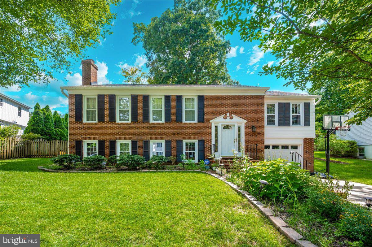 This beautifully updated brick-front home blends timeless charm with sleek, contemporary finishes. Step into an inviting layout featuring rich hardwood floors, a fully renovated eat-in kitchen with high end stainless steel appliances, granite countertops, ideal for both everyday living and entertaining. On the same level enjoy elegantly updated 2 full bathrooms with designer ceramic tile and 3 generous size bedrooms. Downstairs, the fully finished lower level offers a spacious rec room, a private bedroom with a full bath, and a dedicated office space—perfect for working from home or hosting guests.
Step outside to a generously sized deck that overlooks a fenced, landscaped backyard—perfect for outdoor entertaining or relaxing evenings. Additional features include a garage space and a driveway and modern touches throughout.