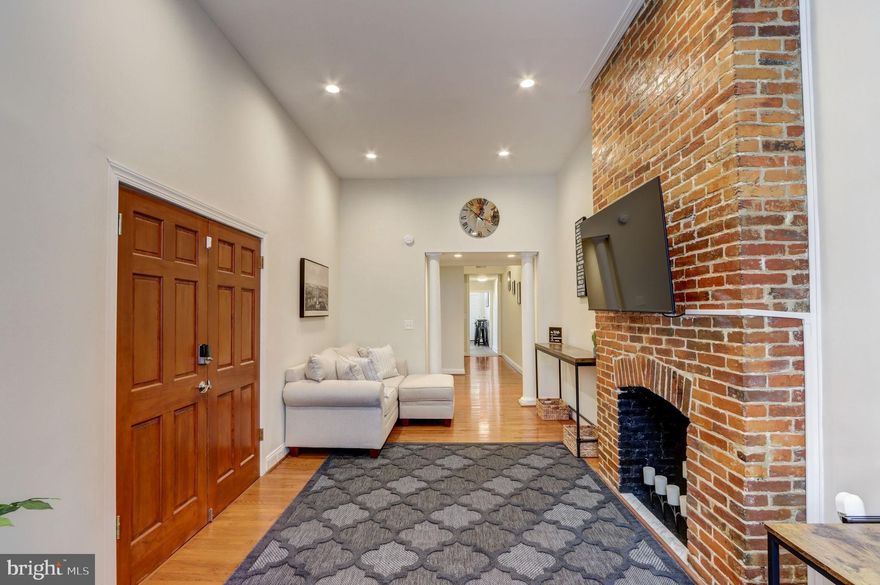 Excellent opportunity to call this triplex home and collect rental income or add three doors to your portfolio. Each level houses separate one bedroom, one bathroom apartments featuring lux vinyl flooring, exposed brick, granite counters, stainless steel appliances, a stackable washer/dryer unit, tons of natural light and modern bathrooms. The first floor unit enjoys a deck off the back. A large parking pad in the rear conveys and adds to the ample on-street parking. The basement level of the building is partially finished providing secure storage space for all residents. Each apartment is separately metered for gas/electric. Owner pays water. First floor = occupied on annual lease ending 01/31/2026 at rent rate of $2050/mo. The 2nd floor apartment has an approved application for $1450/mo. for a one year lease beginning 1/15/26.  The third floor apartment is vacant, move-in ready and perfect to be owner-occupied or for the owner to pick their perfect tenant. Each unit is completely furnished and includes everything needed to provide a 5-star short or mid-term stay. Property professionally managed by Real Property Management Renowned.