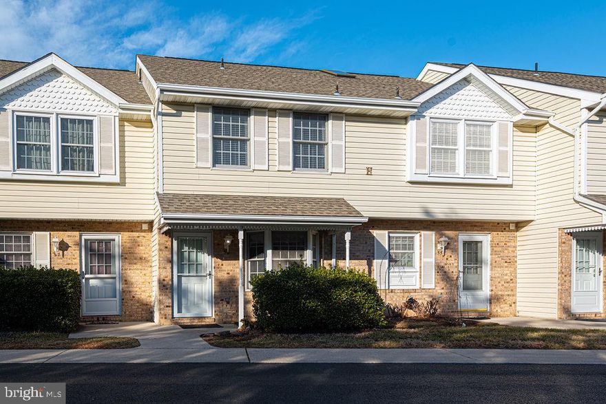 Welcome to Sunset Village, where coastal convenience meets comfort! This beautifully updated townhome is ideally located in the heart of West Ocean City, just minutes from the beach, the Ocean City Boardwalk, marinas, restaurants, shopping, golf, and entertainment. Whether you're heading to Assateague Island, catching a boat at the marina, or enjoying local dining favorites, everything you love about the coast is right at your fingertips. Inside, the home features a bright, open-concept living area with updated flooring and a renovated kitchen—perfect for entertaining or everyday living. The cozy electric fireplace adds warmth and charm to the space, while the upstairs offers refreshed carpeting and a partially floored attic for convenient extra storage. Recent system upgrades include a newer HVAC, washer, and dryer, providing modern comfort and peace of mind. Enjoy your private patio, ideal for relaxing with your morning coffee or unwinding after a day at the beach. The community offers a swimming pool, well-maintained grounds, and low HOA fees that include trash service. Whether you're seeking a primary residence, vacation getaway, or investment opportunity, this West Ocean City gem offers the perfect blend of location, comfort, and value.