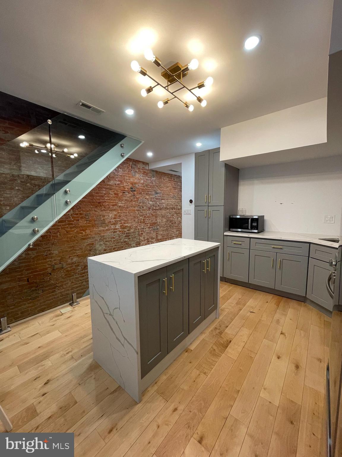 Welcome to 1205 S 4th Street #2 - available for move-in June 1! This 2 bedroom, 2 bathroom home resides in the Pennsport neighborhood of Philadelphia. This recently renovated home features an open concept living/dining space, spacious bedrooms, hardwood flooring, and a spacious private roof deck! The main level boasts exposed brick wall and glass staircase. The beautiful chef's kitchen boasts gold fixtures, stainless steel appliances, and gray cabinetry. In close proximity to all of the restaurants, coffee shops, grocery stores, and parks that Pennsport has to offer, schedule your showing today!